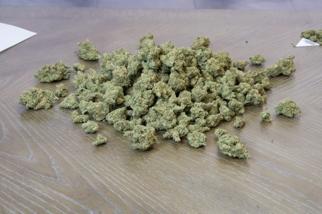 QP of weed on the wooden table